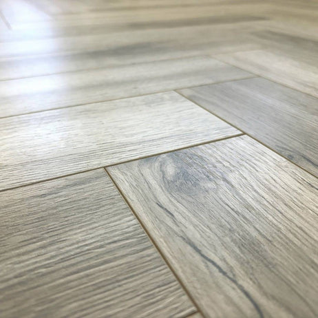 Embrace Herringbone Limed Oak 12mm Laminate