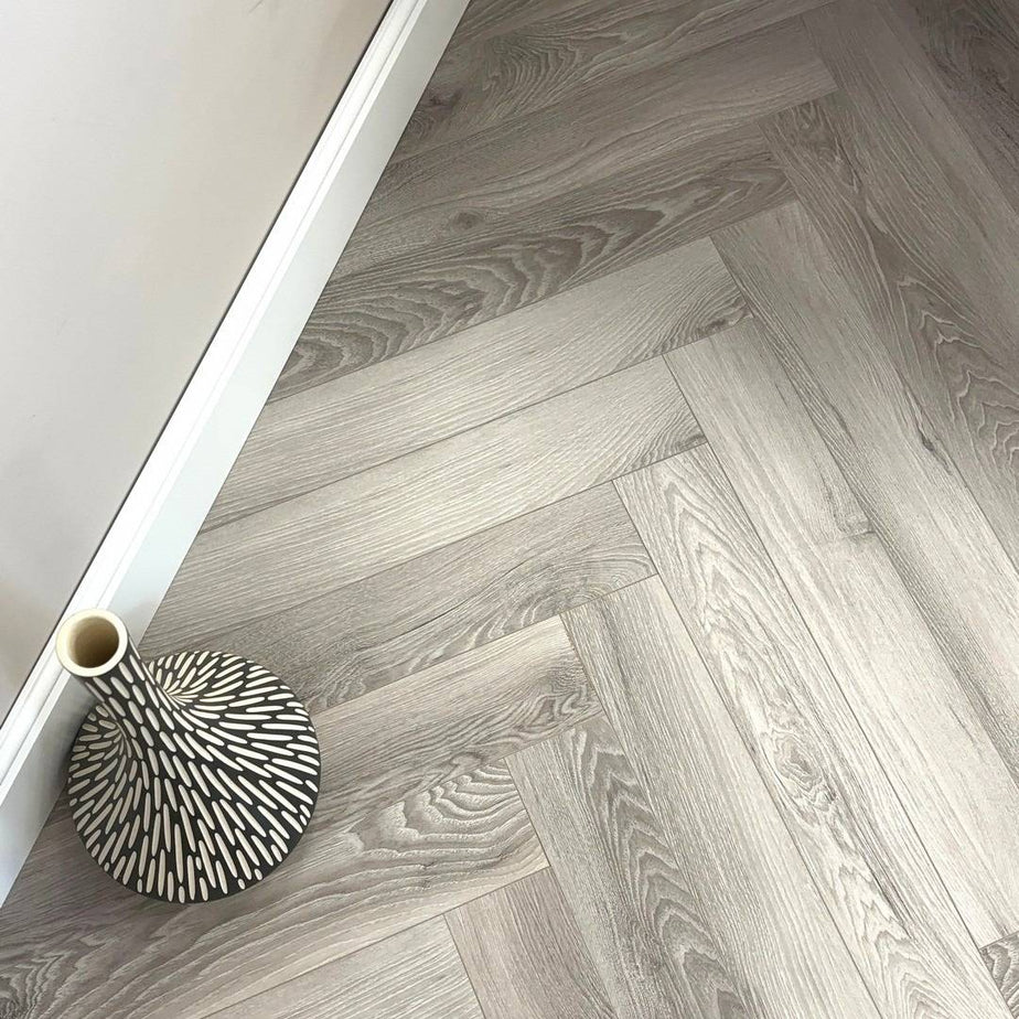 Embrace Herringbone Laminate Flooring Washed Oak 12mm