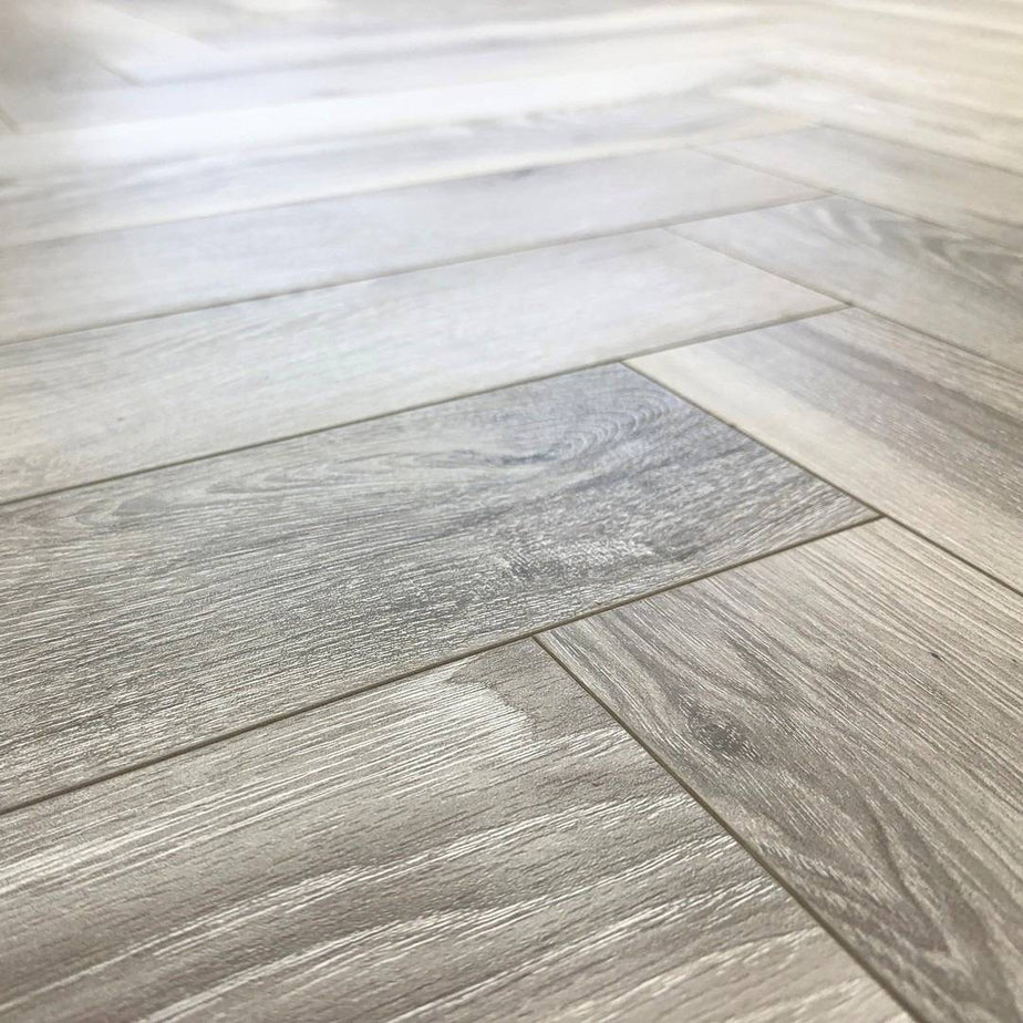 Embrace Herringbone Laminate Flooring Washed Oak 12mm