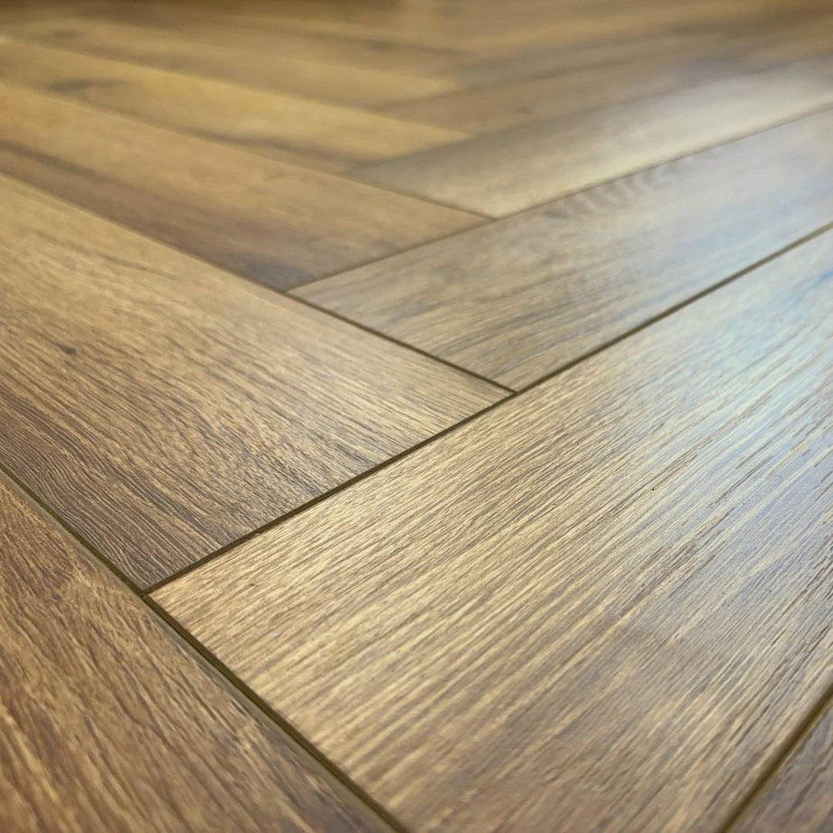 Embrace Herringbone Laminate Flooring Traditional Oak 12mm