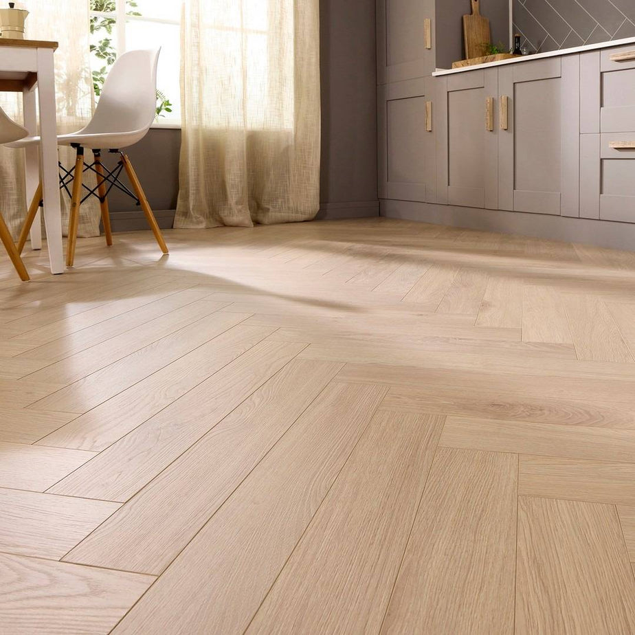 Embrace Herringbone Laminate Flooring Arctic Beige 14mm Built-in Underlay