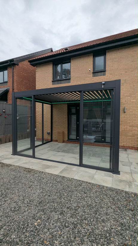 EdgeShade™ 3m x 4m Wall-Mounted Aluminium Pergola, Louvred Roof, RGBW LEDs & 3 Zip Windscreens - Grey