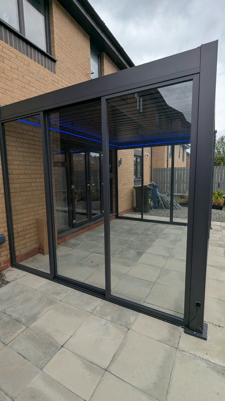 EdgeShade™ 3m x 4m Wall-Mounted Aluminium Pergola, Louvred Roof, RGBW LEDs & 3 Zip Windscreens - Grey