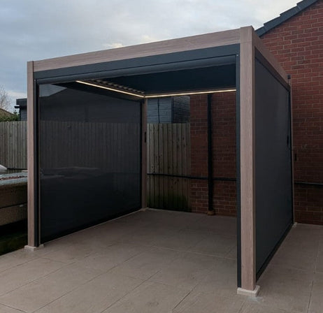 LuxShade™ 3x3m Aluminium Pergola - LEDs, Double-Layer Louvres & 3 Windscreens - Oak Effect
