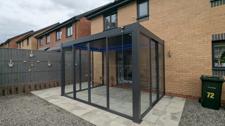 EdgeShade™ 3m x 4m Wall-Mounted Aluminium Pergola, Louvred Roof, RGBW LEDs & 3 Zip Windscreens - Grey